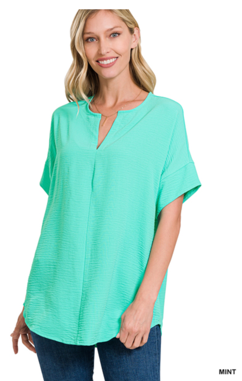 WOVEN AIRFLOW SPLIT NECK SHORT SLEEVE TOP