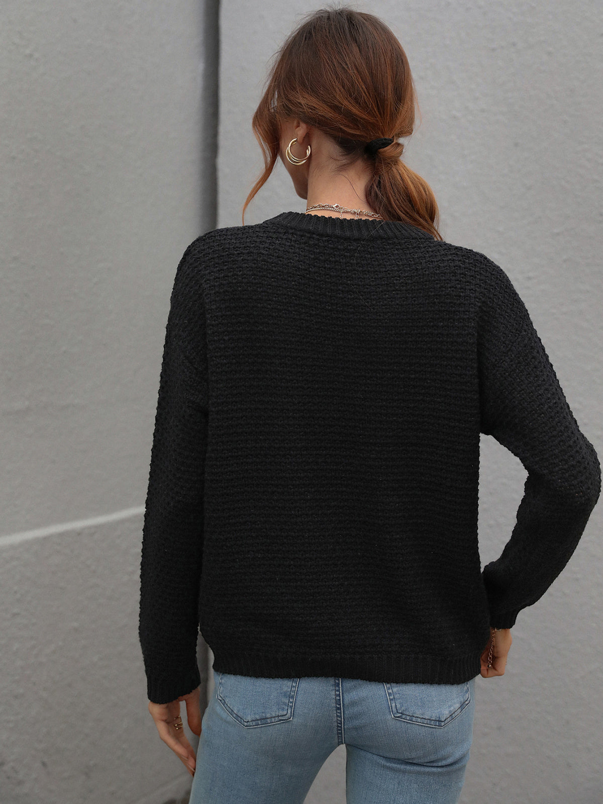 black crewneck sweater