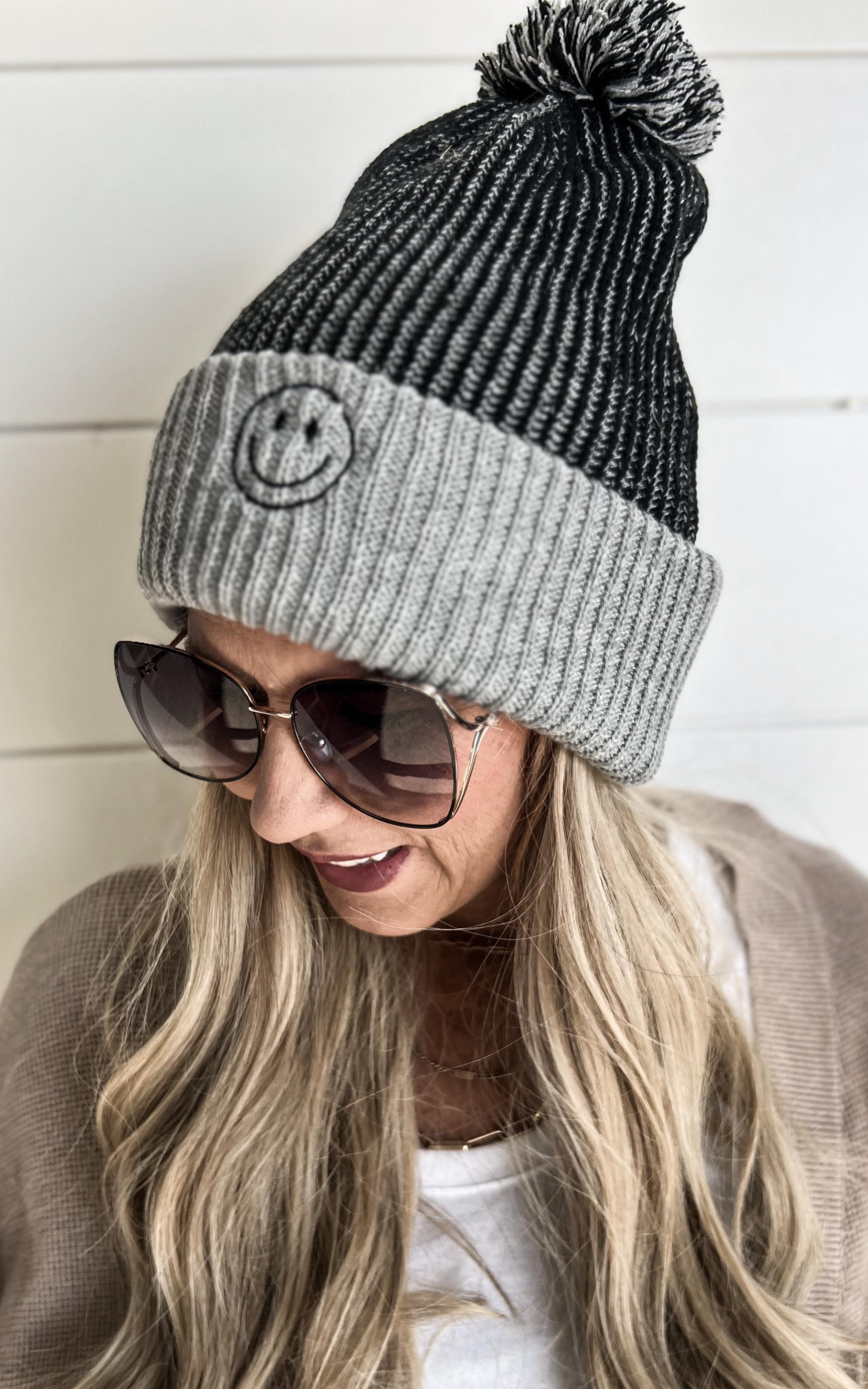 black grey smile pom pom beanie