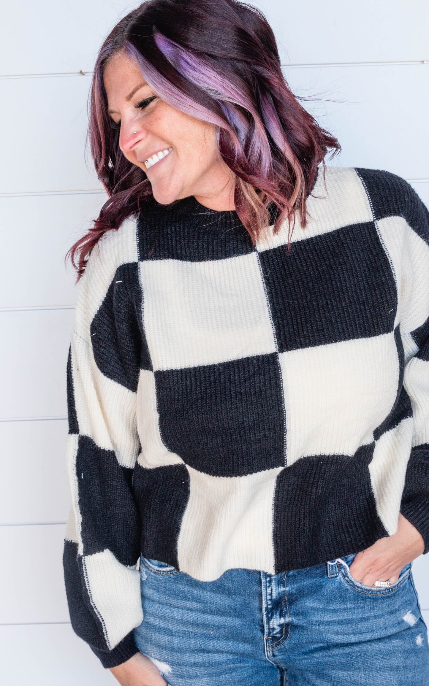 black white checkered sweater