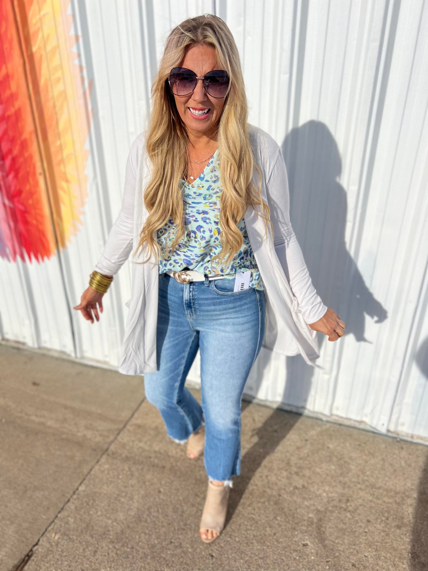 HIGH RISE CROP FLARE W/ UNEVEN HEM DENIM JEANS  | MICA