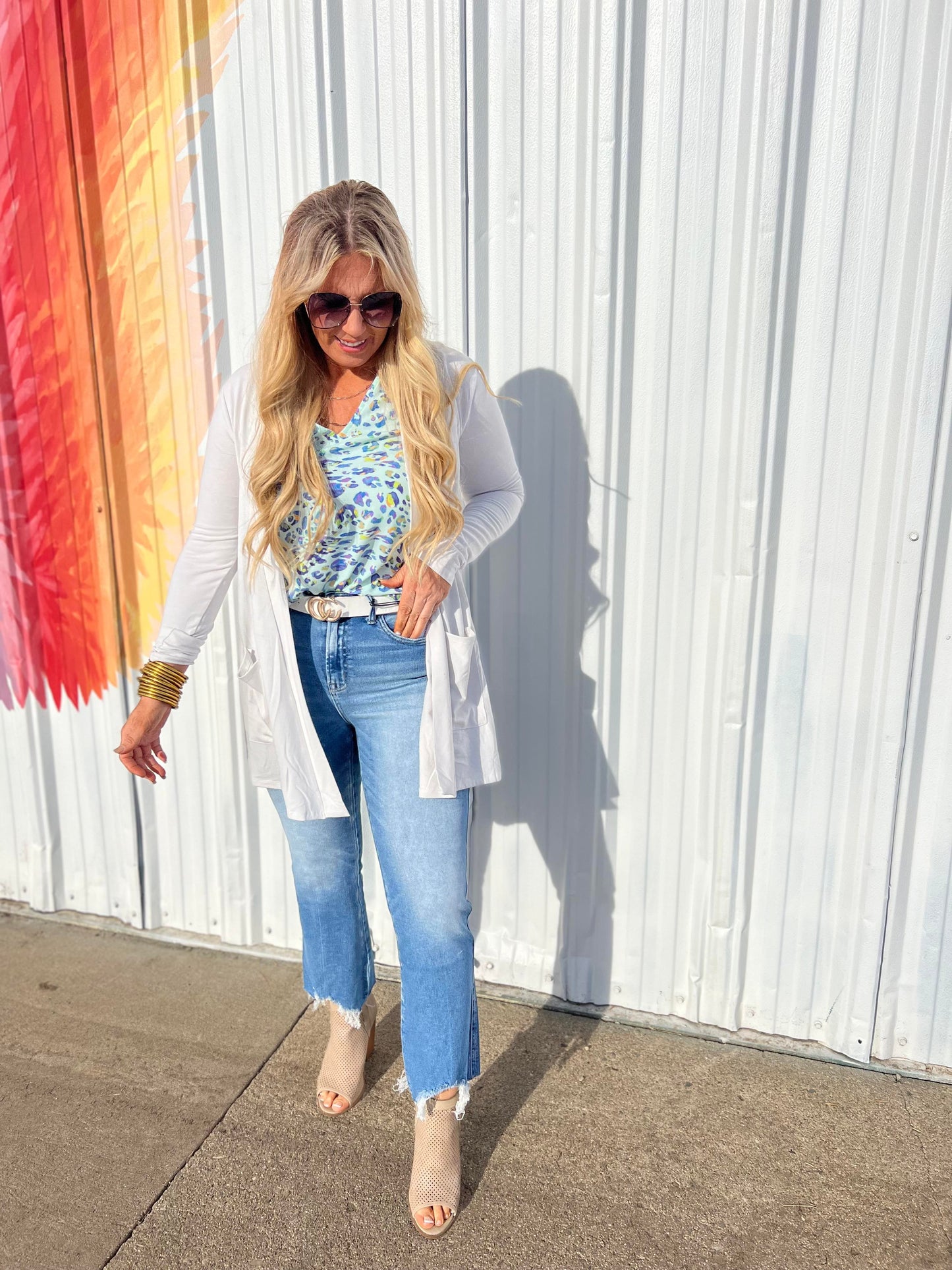 HIGH RISE CROP FLARE W/ UNEVEN HEM DENIM JEANS  | MICA