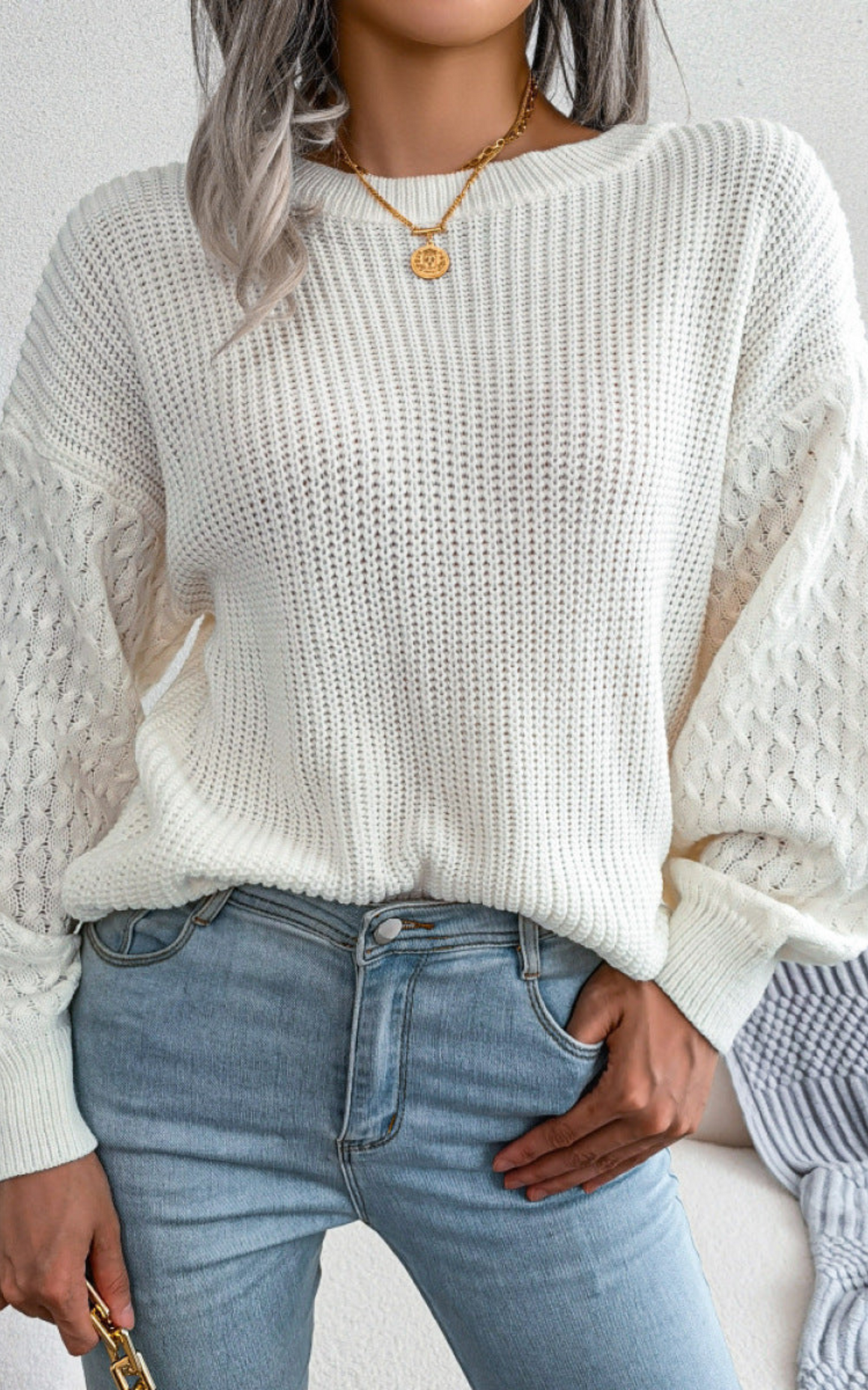 white cable knit sweater